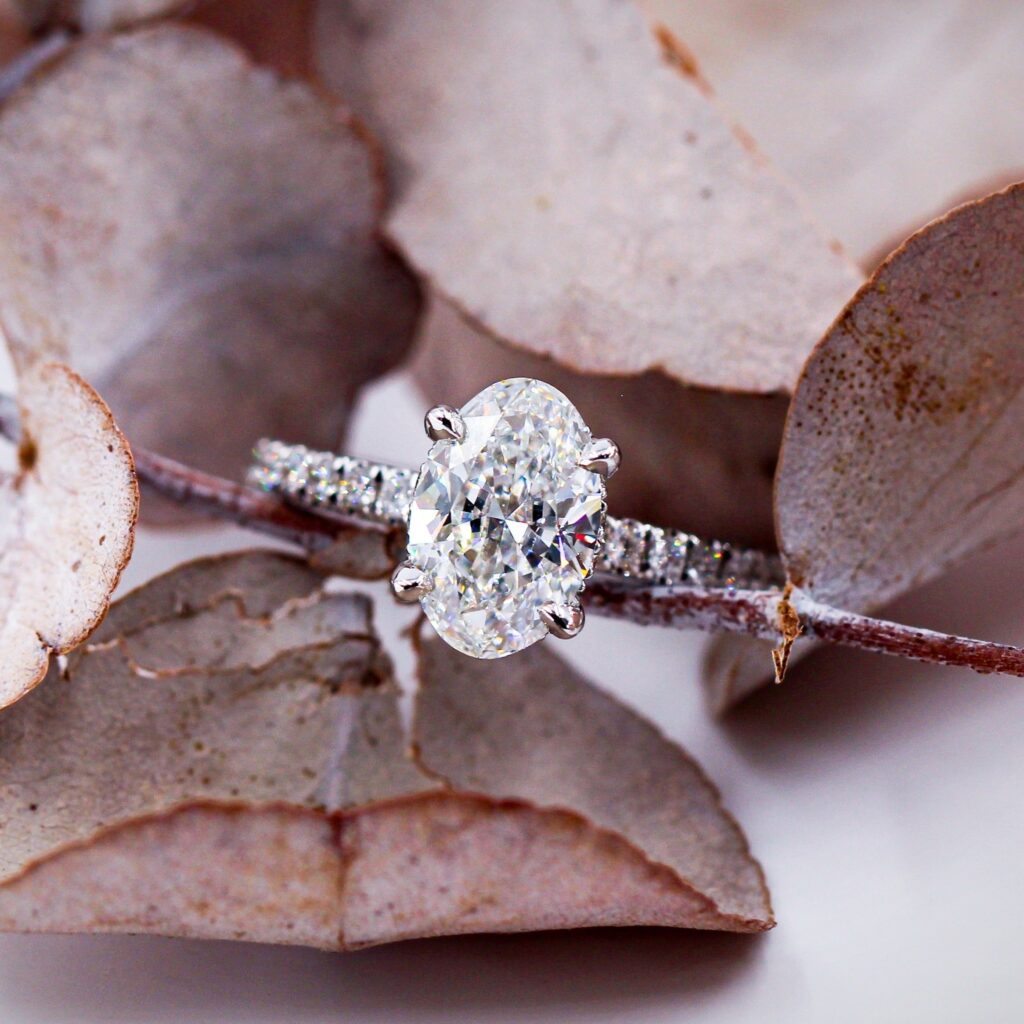 Oval Cut Shoulder Diamond Engagement Rings
