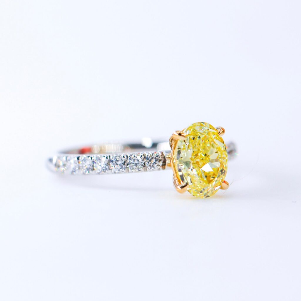 Oval cut Fancy vivid yellow diamond engagement rings Sydney custom design