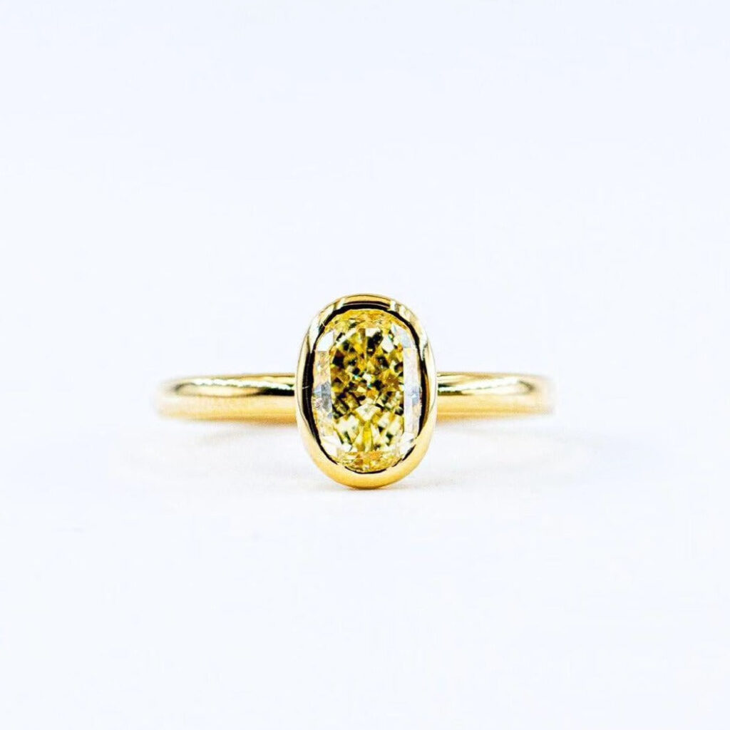 Oval cut Fancy yellow diamond solitaire rings Melbourne best value