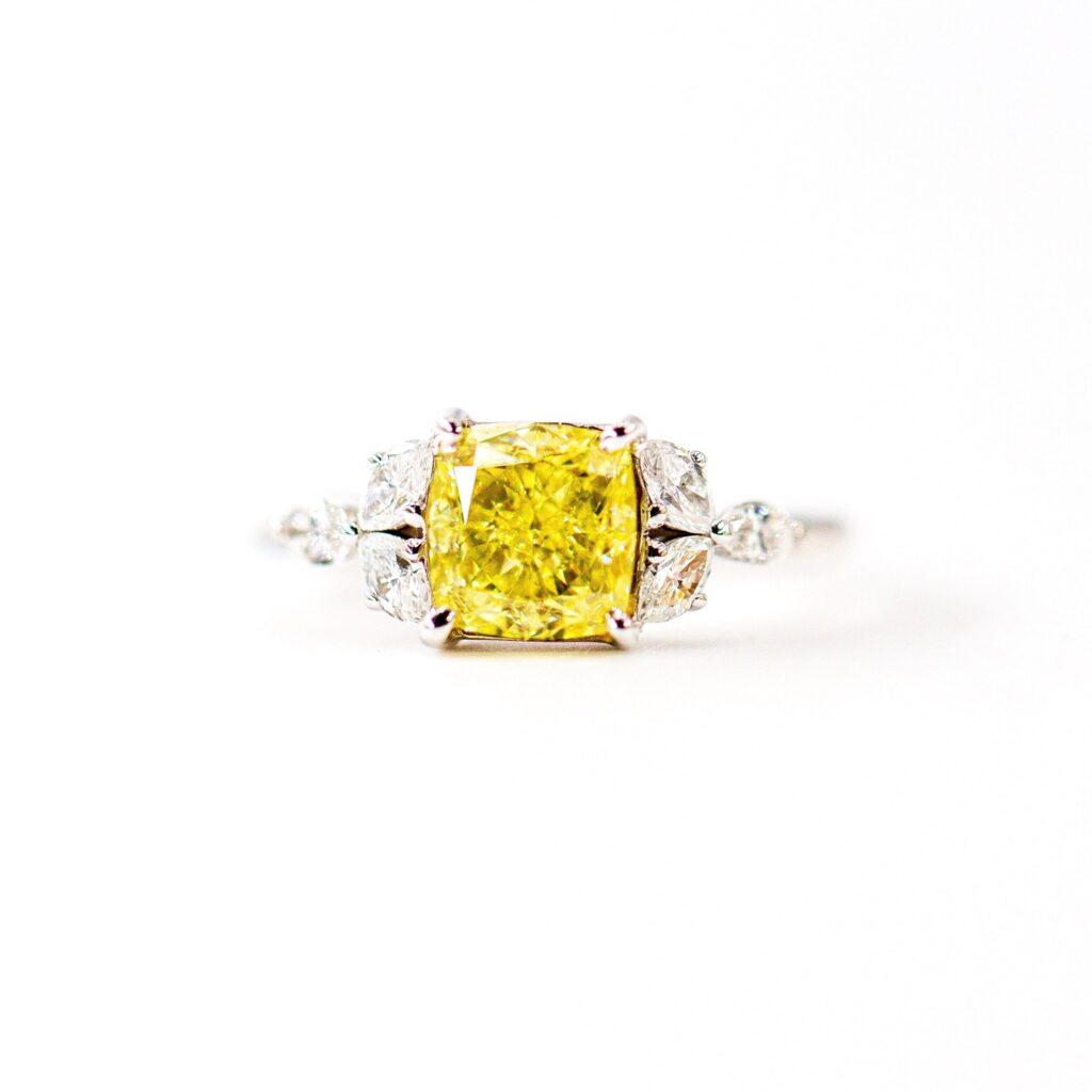 Cushion cut fancy yellow diamond side stone rings sydney best price
