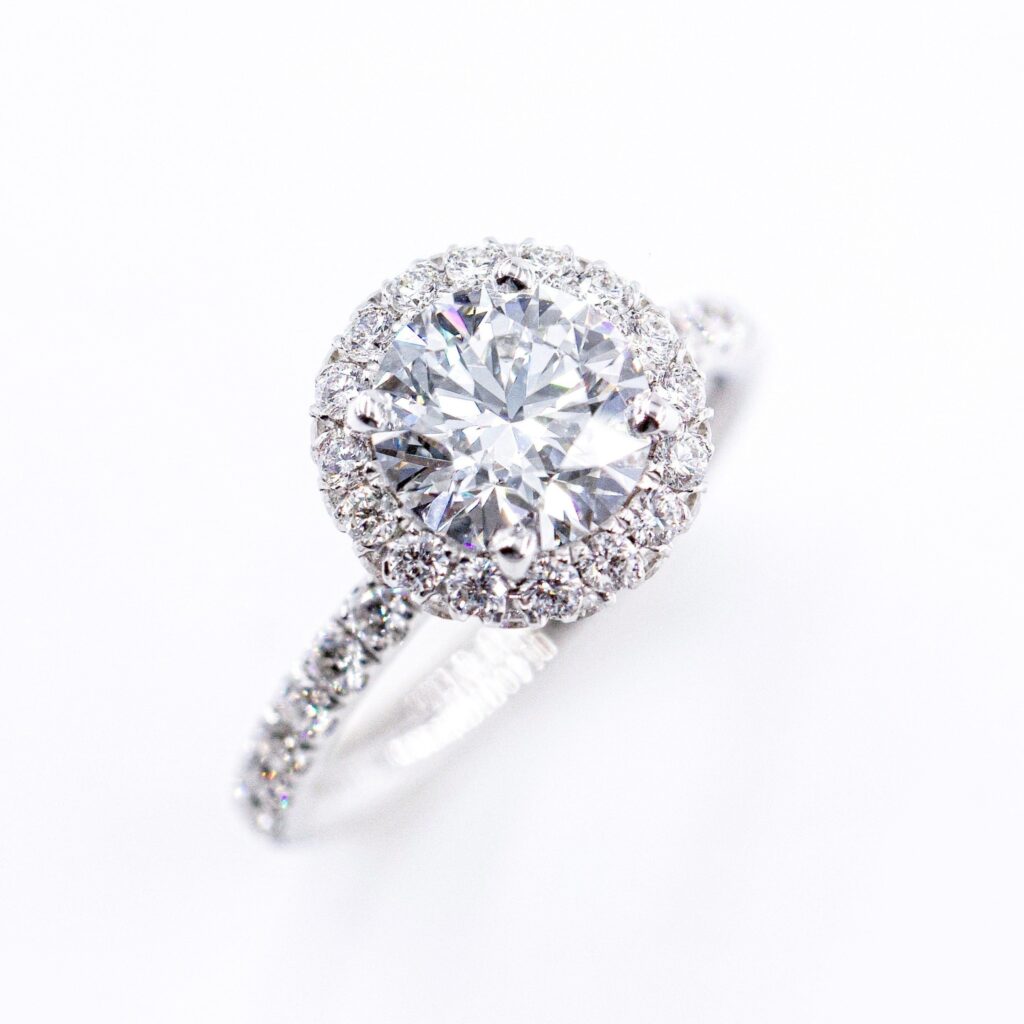 round brilliant cut diamond halo engagement rings melbourne unique design