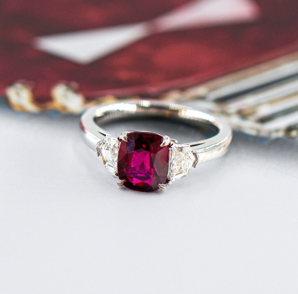 Cushion Cut Ruby Three Stone Ring with Trapezoid cut Diamond - RUR09